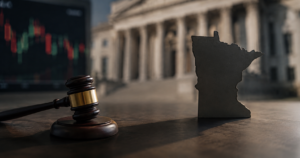 judges gavel in front of courthouse next to figure of Minnesota