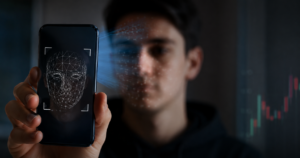person scanning face with cell phone